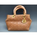 Christian Dior tan leather cannage pattern 'Lady Dior' bag with gold tone hardware, Dior charm and