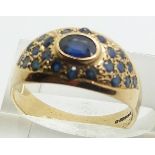 A 9ct gold ring set with sapphires, 3.4g, size Q
