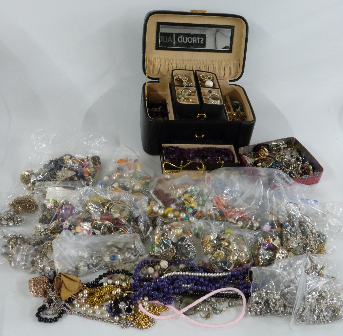 A collection of costume jewellery including beads, brooches, paste necklaces, WBS necklace etc