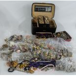 A collection of costume jewellery including beads, brooches, paste necklaces, WBS necklace etc