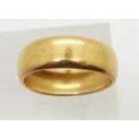 A 22ct gold wedding band/ ring, Birmingham 1920, size P, 7.4g.