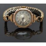 Swiss 9ct gold ladies wristwatch with blue Breguet hands, black Arabic numerals, silver dial and