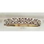 A 9ct gold ring set with diamonds, 2.1g, size M