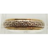 An 18ct gold eternity ring set with diamonds, 4.5g, size M