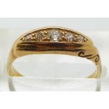 An 18ct gold ring set with diamonds, in original box, size P, 4g