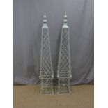 Pair of painted metal garden obelisks, height 162cm