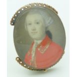 An early Victorian clasp set with a portrait miniature of a gentleman, 3 x 3.5cm