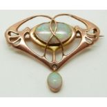 Art Nouveau/ Arts & Crafts 9ct gold brooch set with two opal cabochons by Barnet Henry Joseph