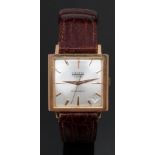Curtis gold plated gentleman's wristwatch with date aperture, gold dauphine hands and baton markers,