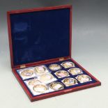 British banknotes GP Commemorative coin collection comprising twelve 50mm gold plated copper coins