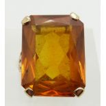 A 9ct gold dress ring set with a large citrine, 8.5g, size N