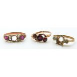 Two Victorian 9ct gold rings one set with garnets and a 9ct gold ring mount, 4.6g