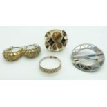 Two silver rings, silver earrings and Scottish silver brooch