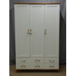 Ikea or similar three door wardrobe with four drawers below, W116 x D57 x H185cm