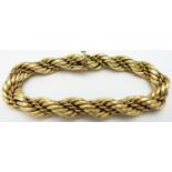 A large 18ct gold textured rope twist bracelet, 40.1g