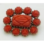 Victorian brooch set with carved coral, 2 x 1.6cm