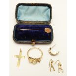 A 9ct gold cross, 9ct gold ring, pair of 9ct gold earrings and a 9ct gold stick pin in original box,