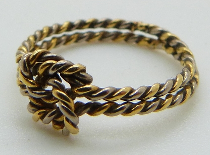 A bi-coloured 9ct gold knot ring, size H, 1.6g. - Image 2 of 2