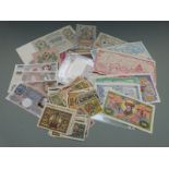 A collection of overseas banknotes etc, to include Polish, Russian, German, Notgeld, Chinese Hell