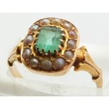 Victorian ring set with an emerald cut emerald surrounded by seed pearls, 3.2g, size M