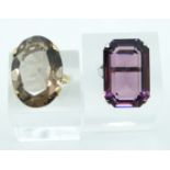 A 9ct gold ring set with paste (size M) and a silver ring set with amethyst (size N)