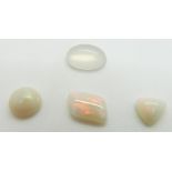 Three loose opal cabochons and a loose moonstone cabochon