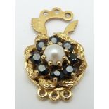 A 9ct gold clasp set with a pearl and sapphires