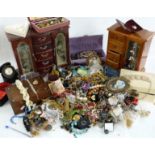 A collection of costume jewellery including beads, brooches etc
