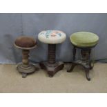 Three circular 19thC piano stools