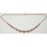 Victorian necklace set with graduated oval pink topaz, 13g