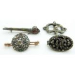 Victorian 9ct gold brooch set with a cluster of foiled paste, Victorian paste buckle, and a silver