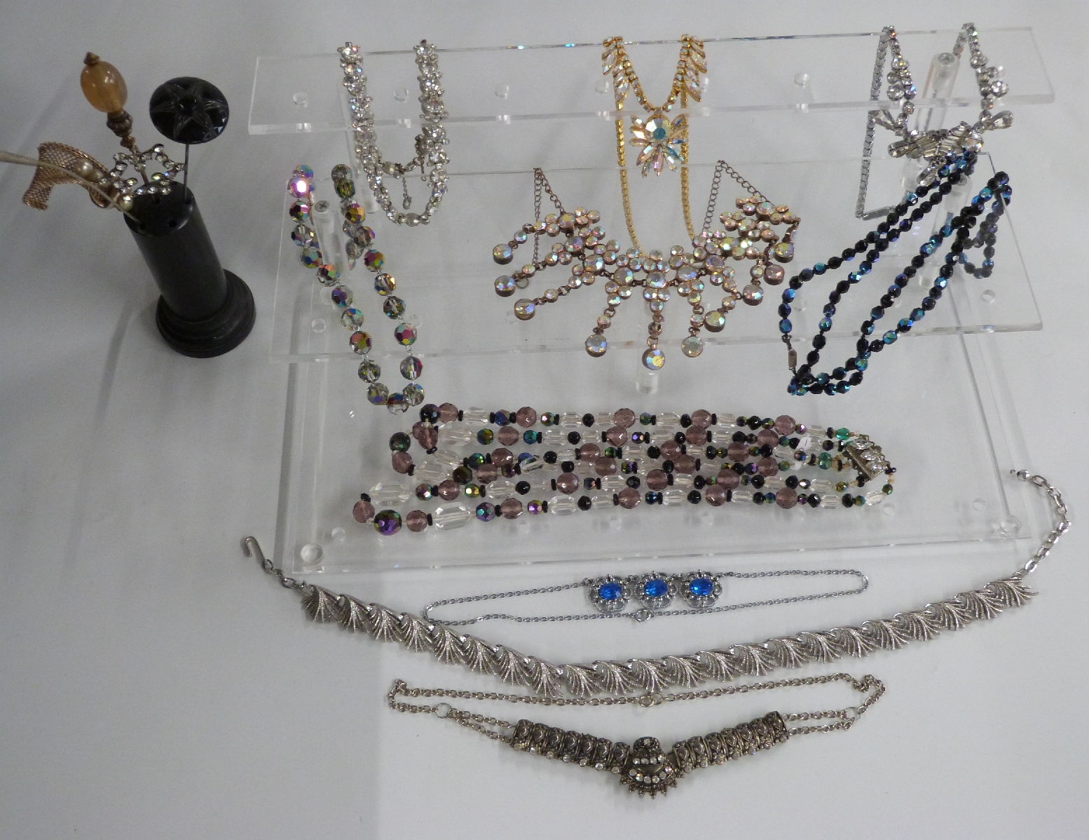 A collection of beaded necklaces including 1950s, jet, onyx, diamanté, glass etc, in a large blue - Image 3 of 5