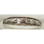 An 18ct white gold ring set with eight diamonds, 2.3g, size N