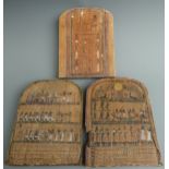 Three Egyptian style wooden panels each decorated with hieroglyphs, each approximately 34cm x 25cm