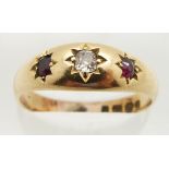 Victorian 18ct gold ring set with an old cut diamond and two garnets, Birmingham 1891, 3.8g, size Q