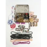 A collection of jewellery including Victorian brooches, micro mosaic brooch, coins, jet brooch,