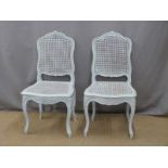 Pair of bergere seated shabby chic chairs