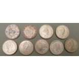 A collection of crown sized coins including 1935 'rocking horse' example