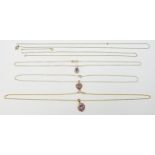 Three 9ct gold necklaces one set with an amethyst, 6.7g