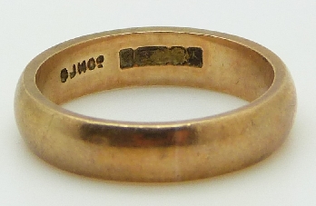 A 9ct gold wedding ring/ band and a 9ct gold eternity ring, 6.9g - Image 2 of 3