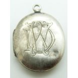 Victorian locket engraved with emblem and 'In Utrumque Paratus'