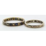 A 9ct gold eternity ring (2g) and another eternity ring