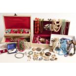 A collection of costume jewellery including beads, brooches including Hollywood, silver brooch,