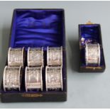 Cased set of six Edward VII hallmarked silver napkin rings, Chester 1907 maker Henry Williamson Ltd,