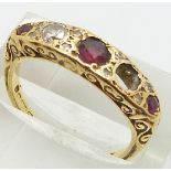 An 18ct gold ring set with rubies and diamonds, 4.0g, size M