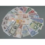 A collection of UK banknotes, £10, £5, £1, ten shillings, Scottish £5 and £1 etc, to include a