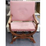 COLLECTING Liberty and Co upholstered oak Roman style chair with stud work decoration and X frame