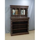 Victorian carved oak mirror back dresser/buffet, the base having two drawers with adjustable shelves