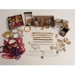 A collection of costume jewellery including watches, earrings, brooches, vintage paste necklace etc