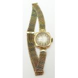 A 15ct gold watch and tri-coloured strap, 18.6g